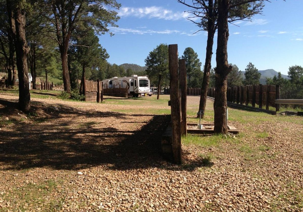 Terraced RV sites stepping up the ponderosa hillside above Ruidoso Downs
